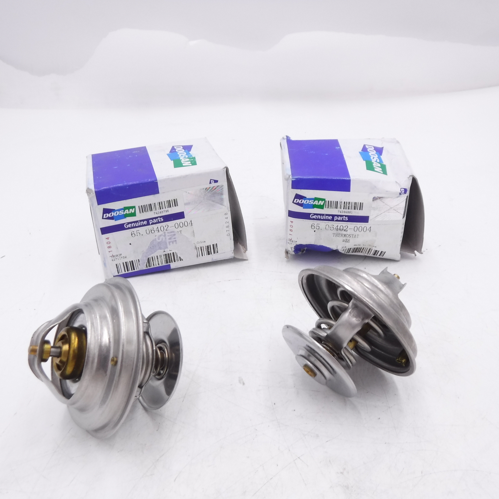 Doosan 65.06402-0004 THERMOSTAT 83c